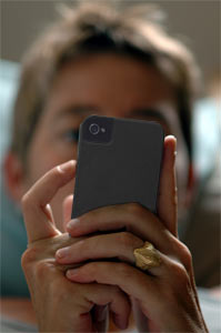 Reading Phone in Bed